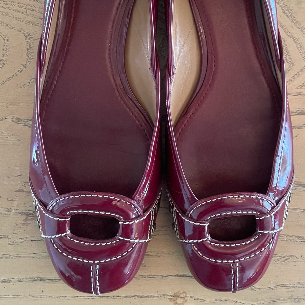 Patent ballet flats in pristine condition.